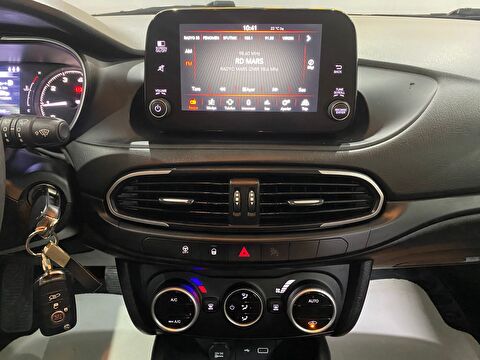 TaksitliOto.Net | 2.El Fiat Egea Cross 1.4 Fire Urban | Manuel & Benzin | Gri | İzmir.2el 2023 Benzin Manuel Fiat Egea Gri Gürel Tasarım Aksesuar Otomotiv San. Tic. Ltd. Şti.