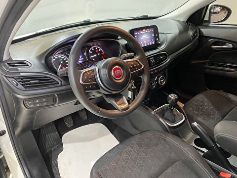 TaksitliOto.Net | 2.El Fiat Egea Cross 1.4 Fire Urban | Manuel & Benzin | Beyaz | İzmir.2el 2021 Benzin Manuel Fiat Egea Beyaz Gürel Tasarım Aksesuar Otomotiv San. Tic. Ltd. Şti.